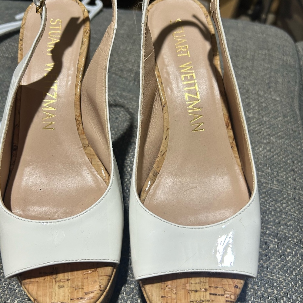 Stuart Whitman sling back wedges.